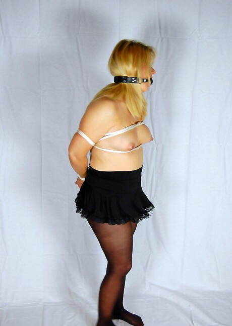 Black Fox Fetish invites you to browse their free pics with winsome damsel in perverted bdsm scene